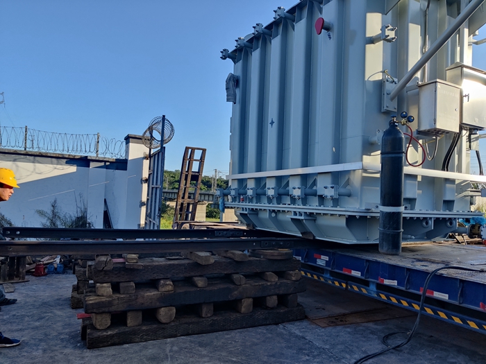 1632321053140412.jpg 图二:变压器卸载 - 副本.jpg